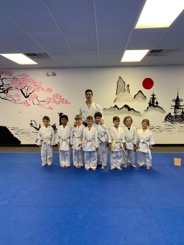 Kazoku Karate Greenville, South Carolina martial arts school - Sensei Alejandro Rodríguez with his kids students, private karate classes for kids starting from 5 years old