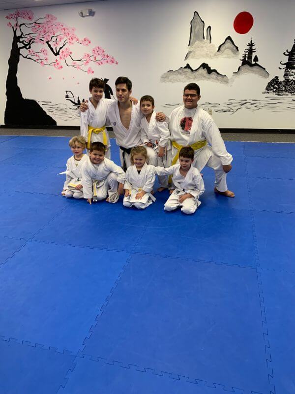 Sensei Alejandro Rodríguez with a group of little kids of Baby Ninjas karate classes in Greenville, South Carolina - We are a big family, very inclusive martial arts dojo